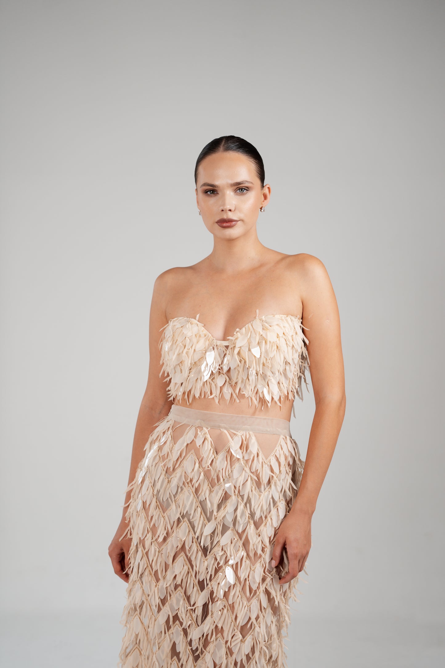 NUDE TWO PIECE BIRD SKIRT AND CROP TOP